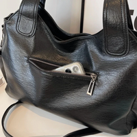 Stylish leather shoulder bag with zipper