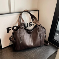 Stylish leather shoulder bag with zipper