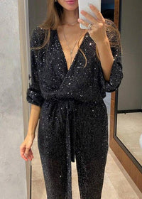 Tuta da donna con paillettes e maniche lunghe