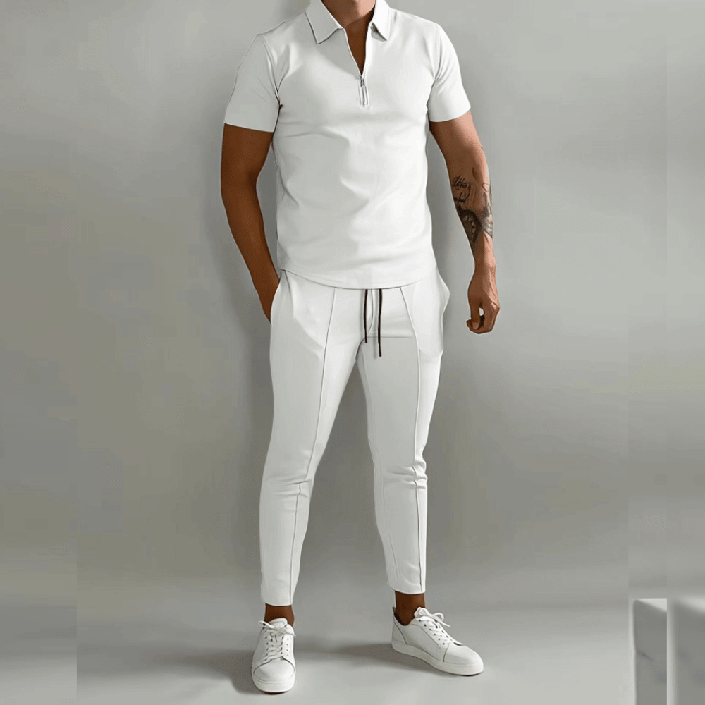 Completo elegante da uomo con polo e pantaloni